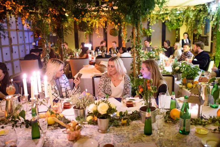 Guests at a botanical dinner