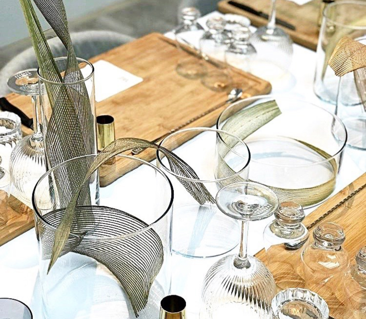 Styled glassware and leaves