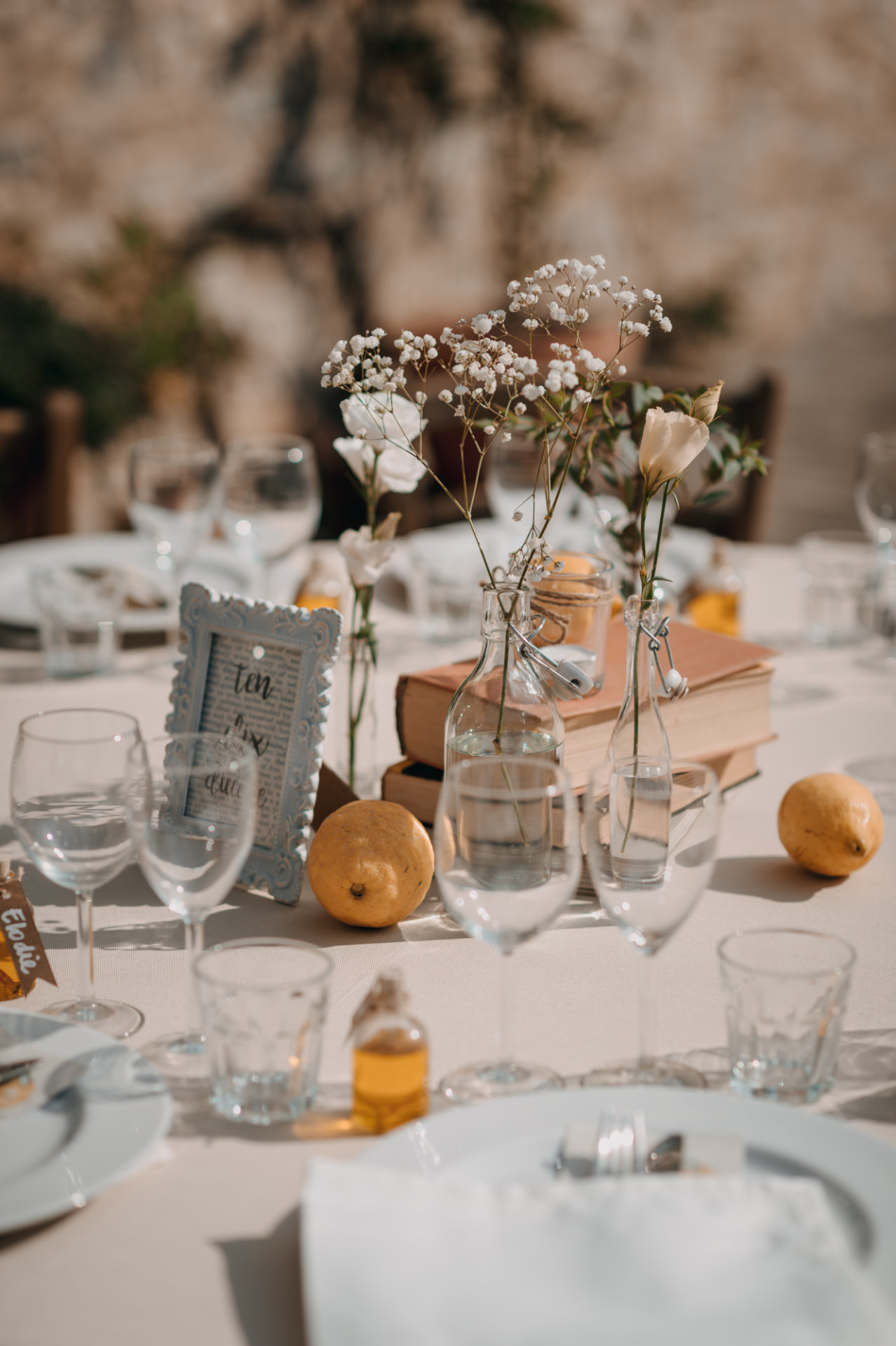 Soft floral table styling with lemons