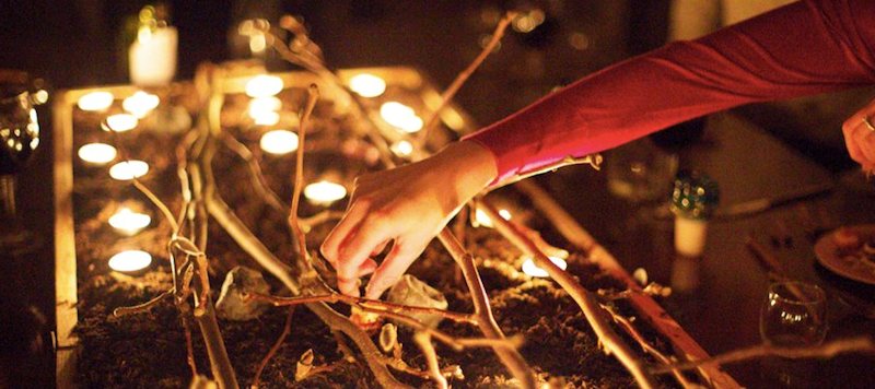 Candlelit edible stories installation